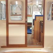 pont_teck_naturel_rhea_850_timonier_cockpit_passavants_joints_gris_occasion_fil-marine.jpg